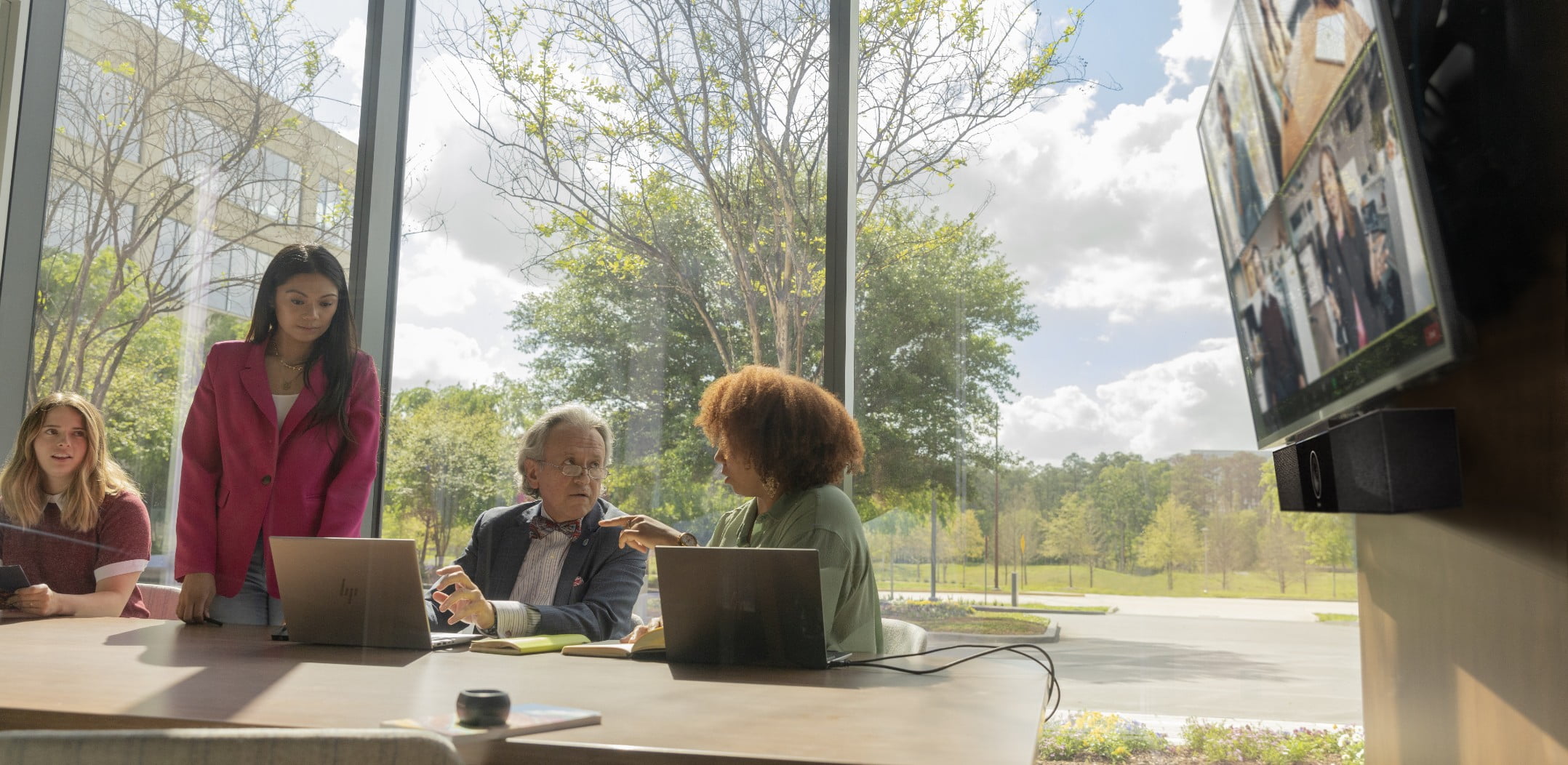 People on a video conference call with Poly Studio USB