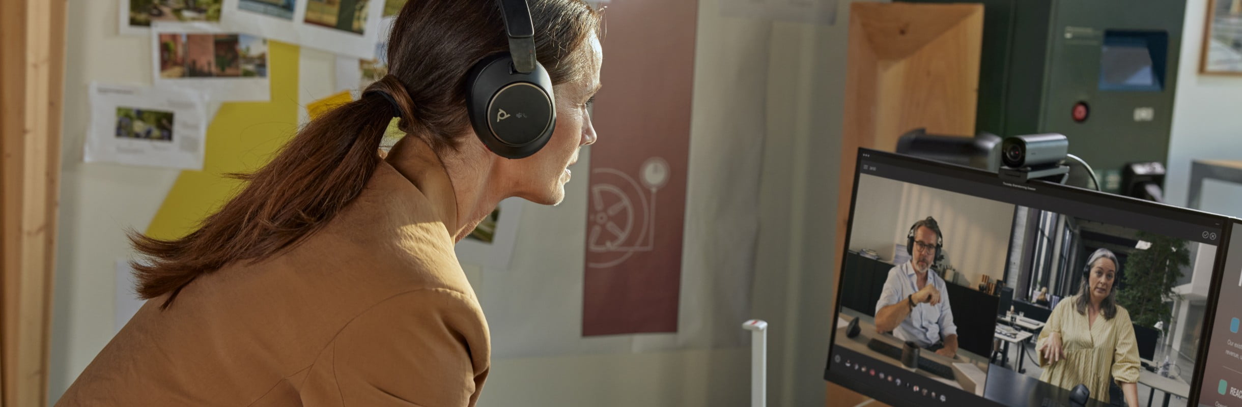 Woman with headset on video call