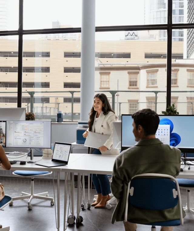 Team working together at desk in office