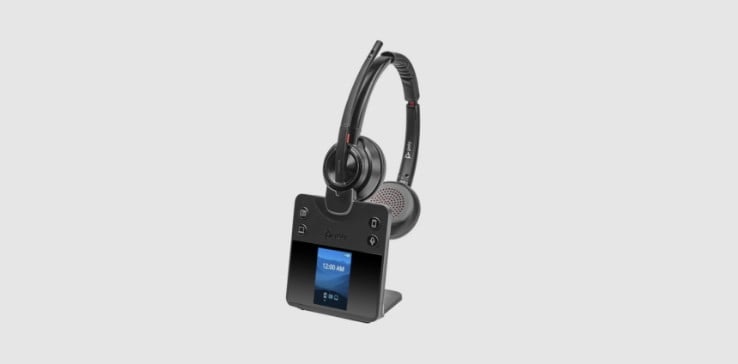 Poly Savi 8420 noise cancelling stereo headset on office base stand