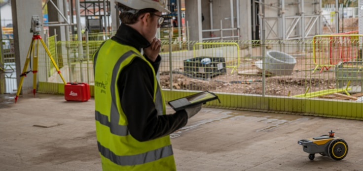 On-site engineer controlling the HP SitePrint robot from a tablet