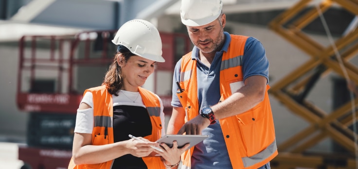 Engineers looking at the results of using new solutions for mechanical systems installation