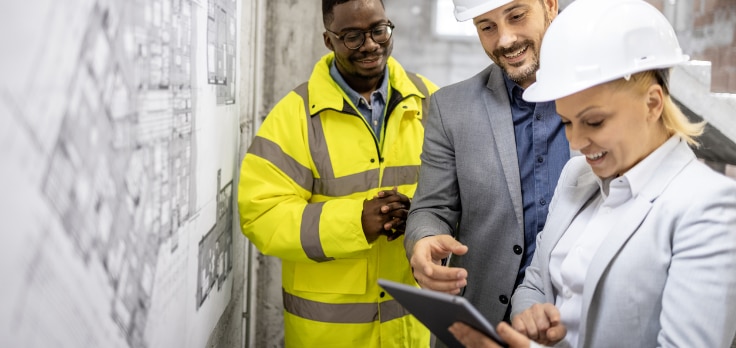 Team discussing new strategies on how to accurately install new plumbing systems