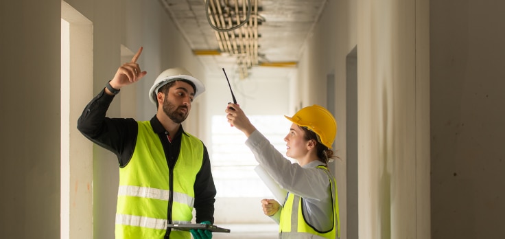Mechanical engineers discussing fire protection system installations and how to improve mechanical construction site operations
